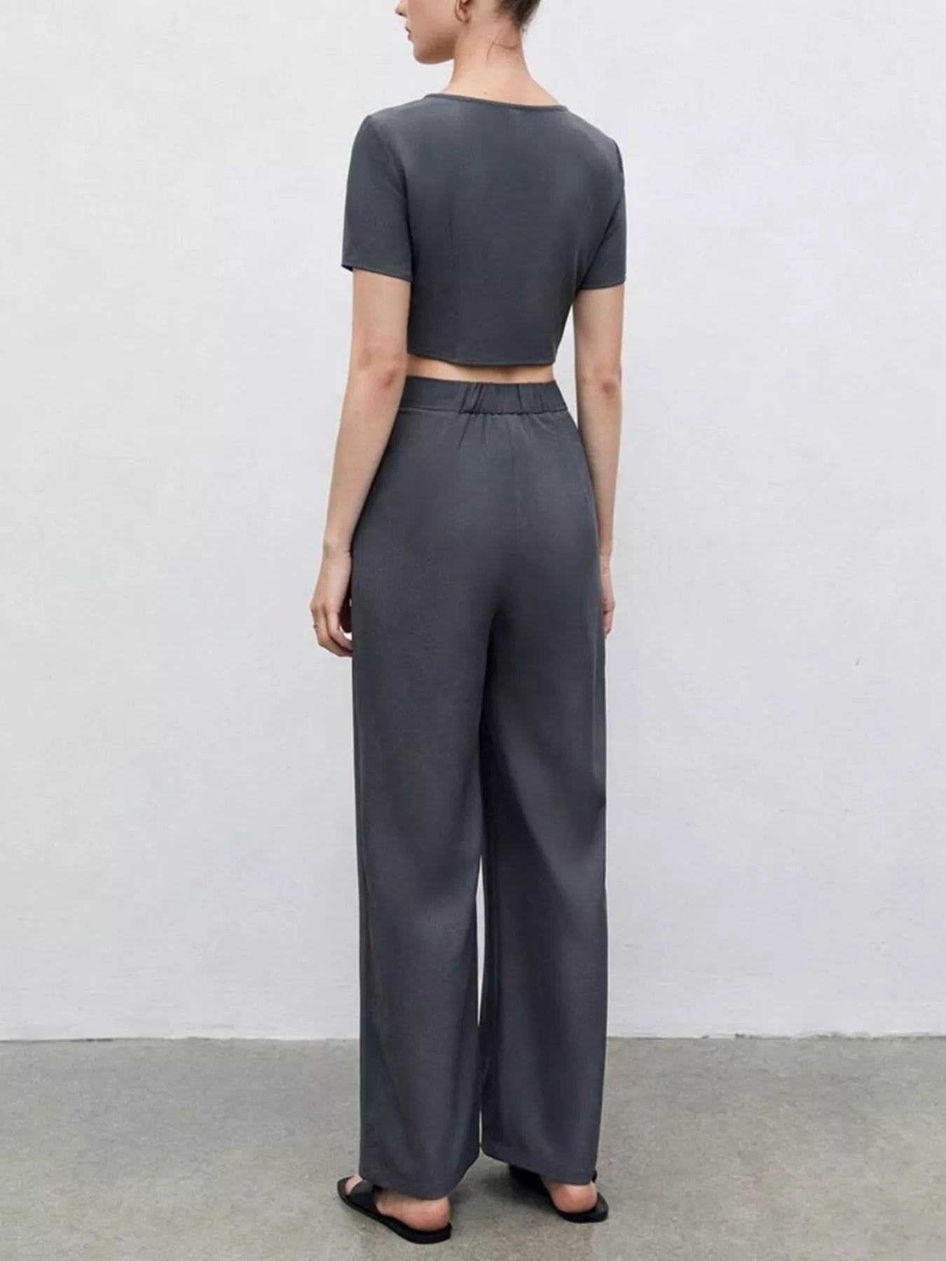 Back view of the Gray Crop Top & Wide Leg Pants Set showcasing its comfortable fit and stylish design.